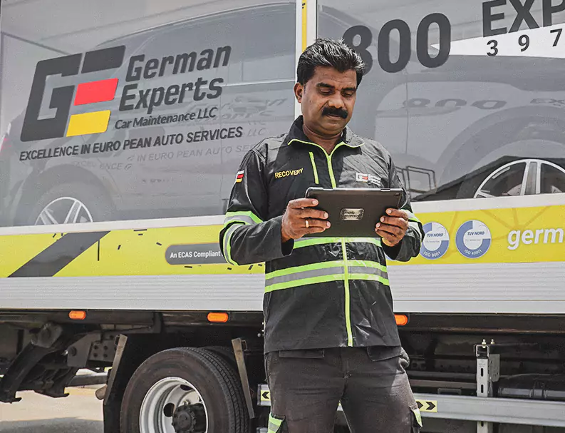 A German Expert Checking the Chasis number on Tablet