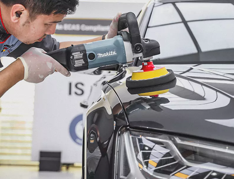 A German Expert Polishing the Car Bonnet