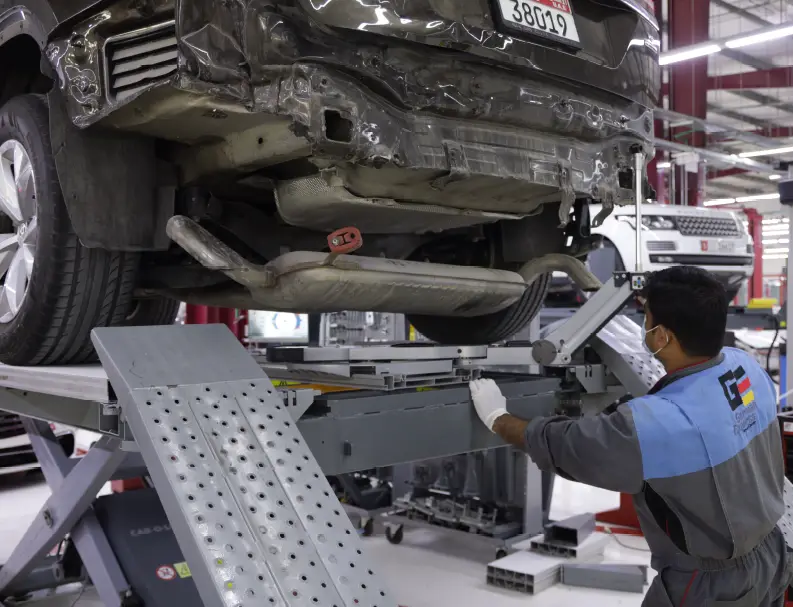 Car Chassis Repair service An Expert Checking the Car Chasis Number