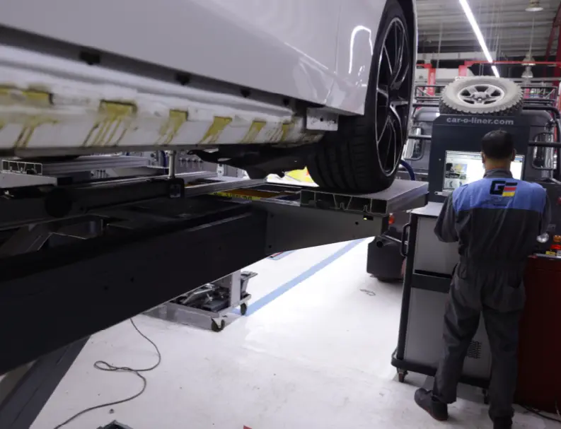 A German Expert Repairing Car Chasis Number