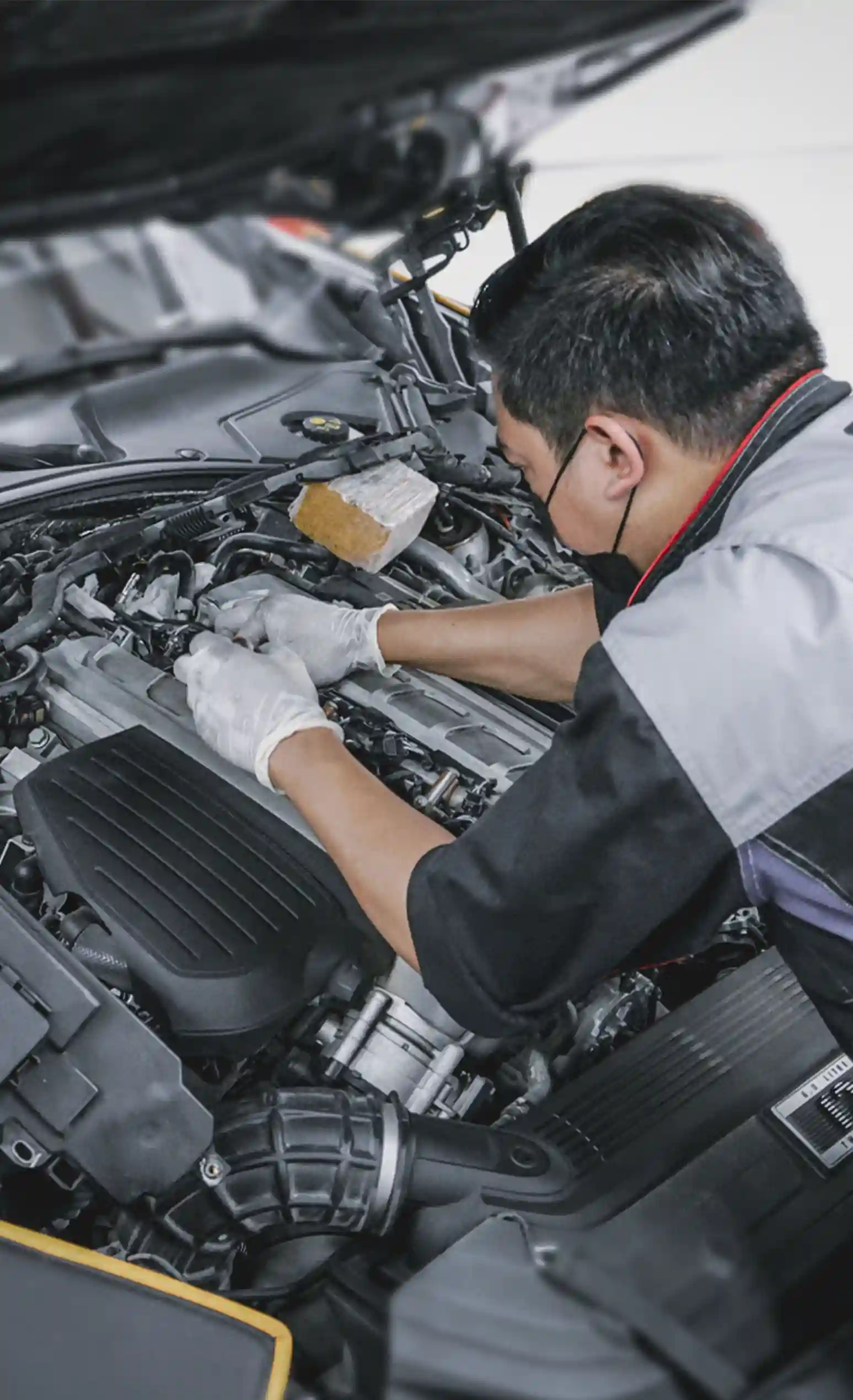 German Expert Fixing the Car Fuel Injection System
