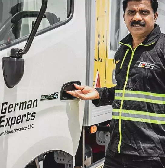 German expert is standing with car recovery vehicle