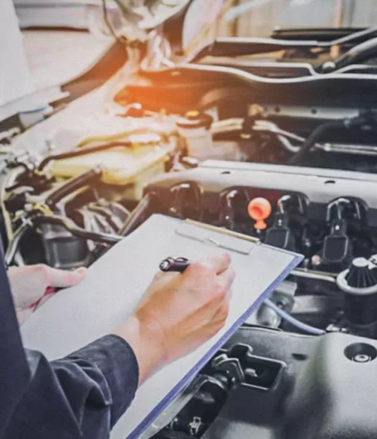 An expert writing the transmission issues on paper