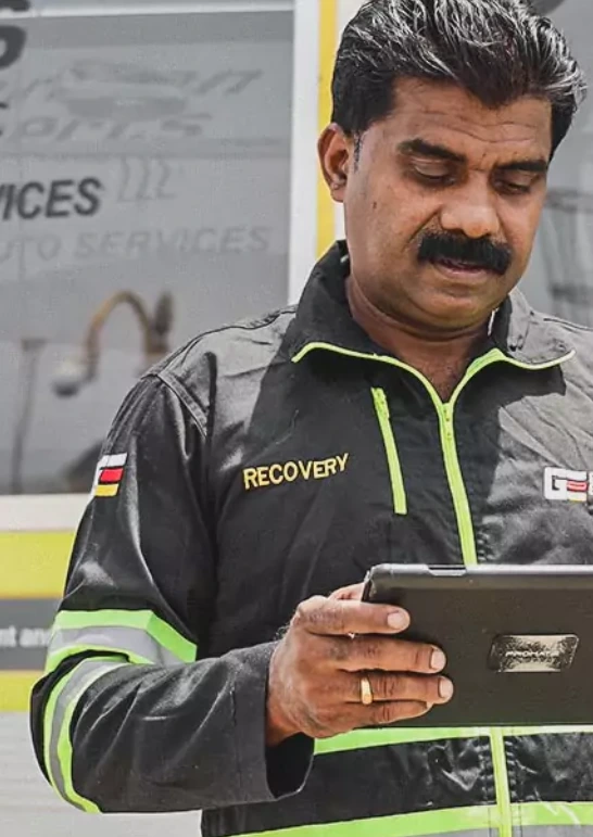 German Expert Holding the Tablet