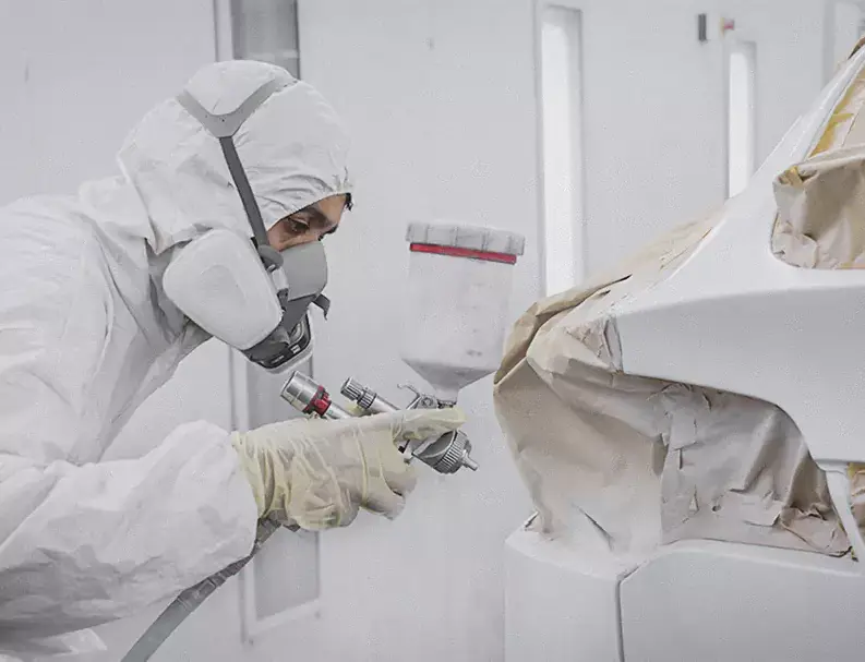 German Expert Spray Painting on Car Body