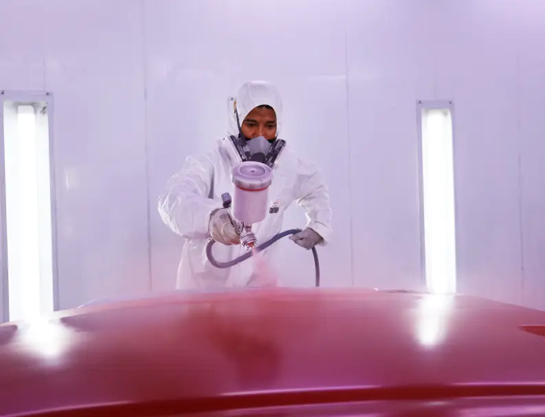 German Expert Spray Painting on car body