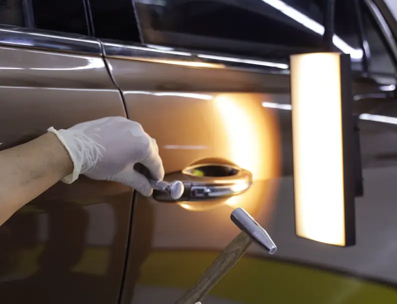 A German Expert Painting White Car