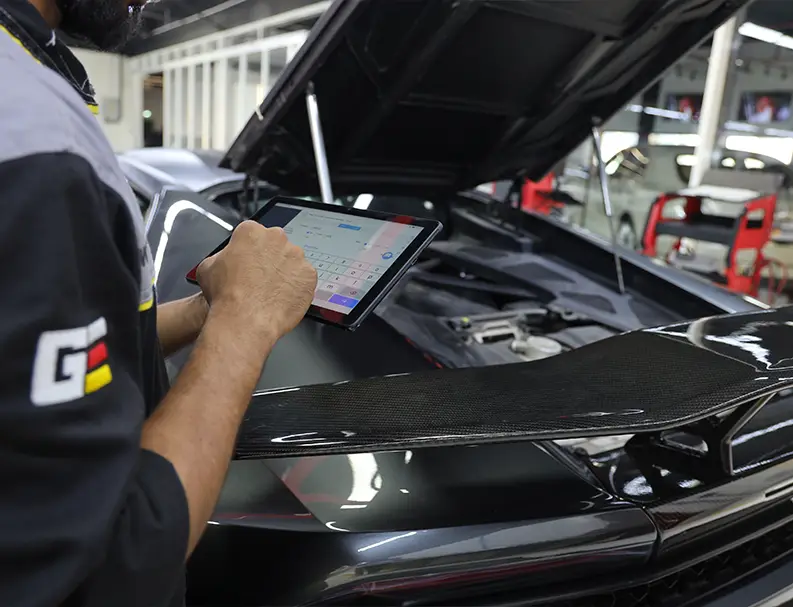 A Worker Holding the Tablet