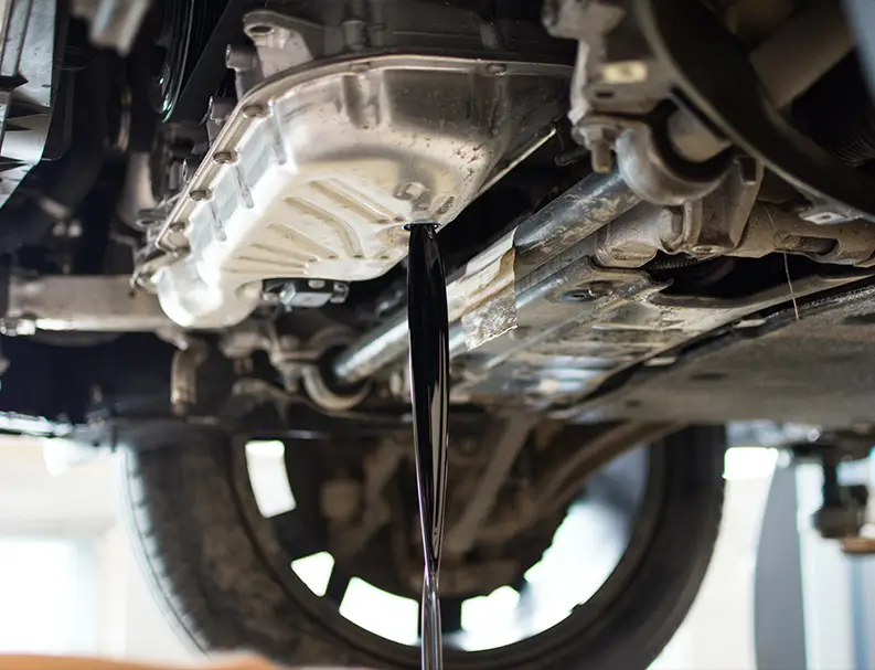 German Expert Fixing the Car Windshield Wiper