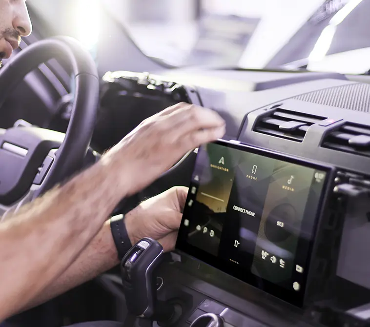A German Expert Scanning the Car Problem on Laptop